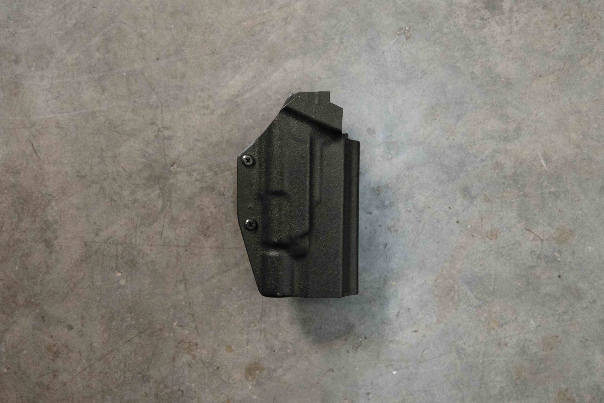 pros and cons of light bearing holsters
